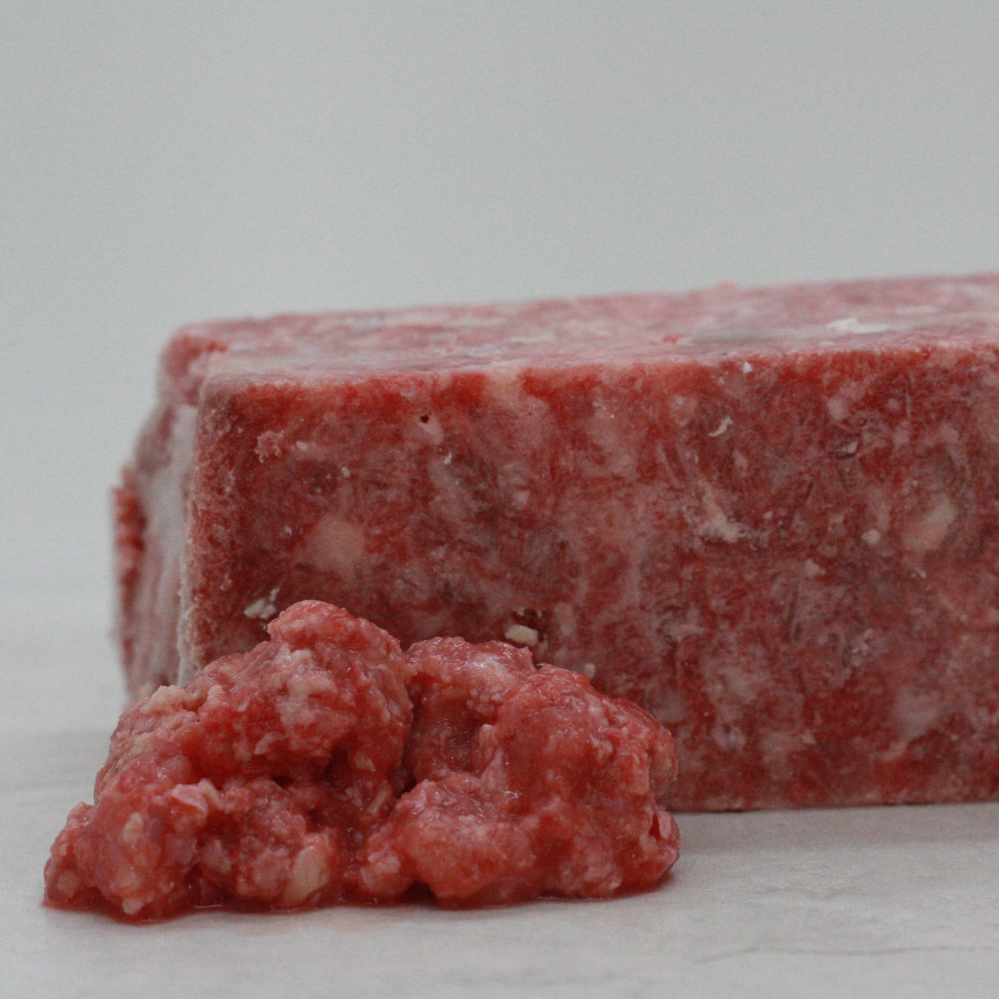 Chicken Ground with Bone per pound (cubed)